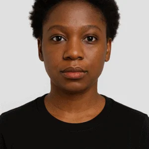 Elegant portrait of African woman with natural hairstyle on neutral background.