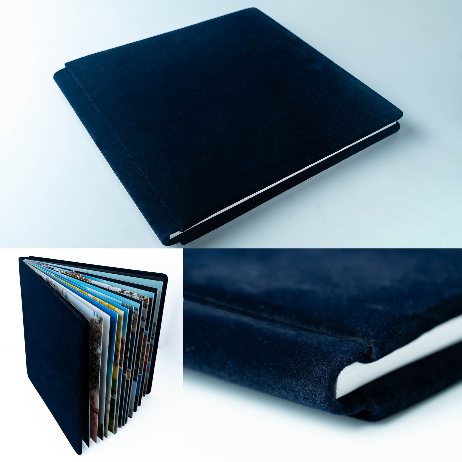 Black photo album with white pages on a white background.